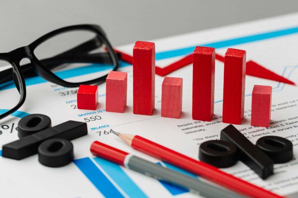 accounting papers graph pencils glasses and percent signs presented by SK Financial Services https://skfinancial.co