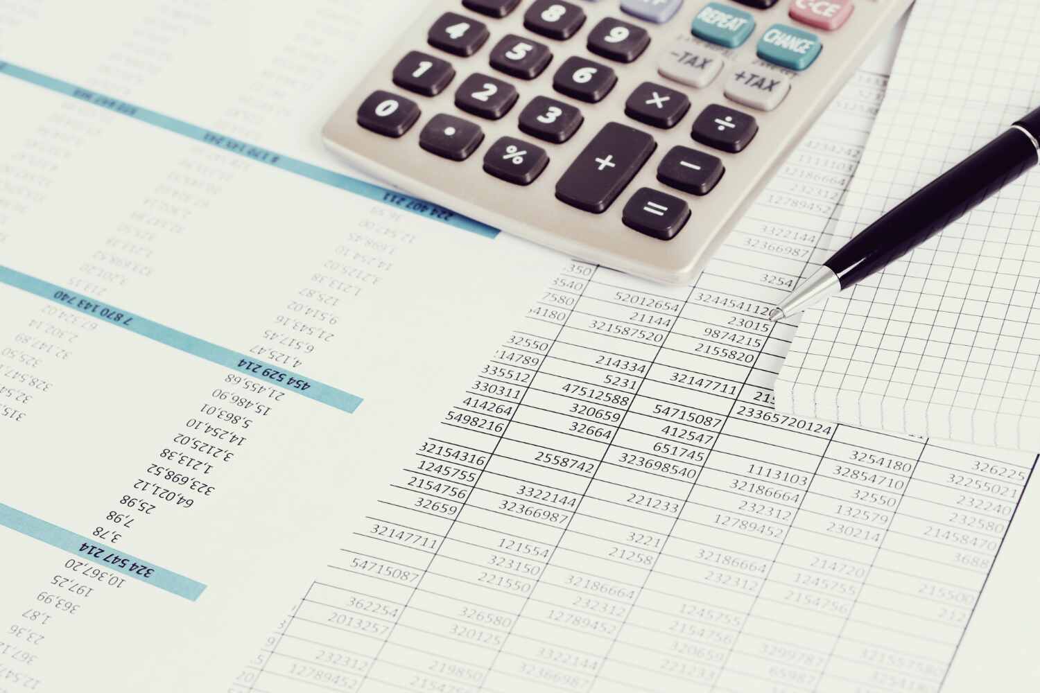 accounting papers calculator and pen presented by SK Financial Services https://skfinancial.co