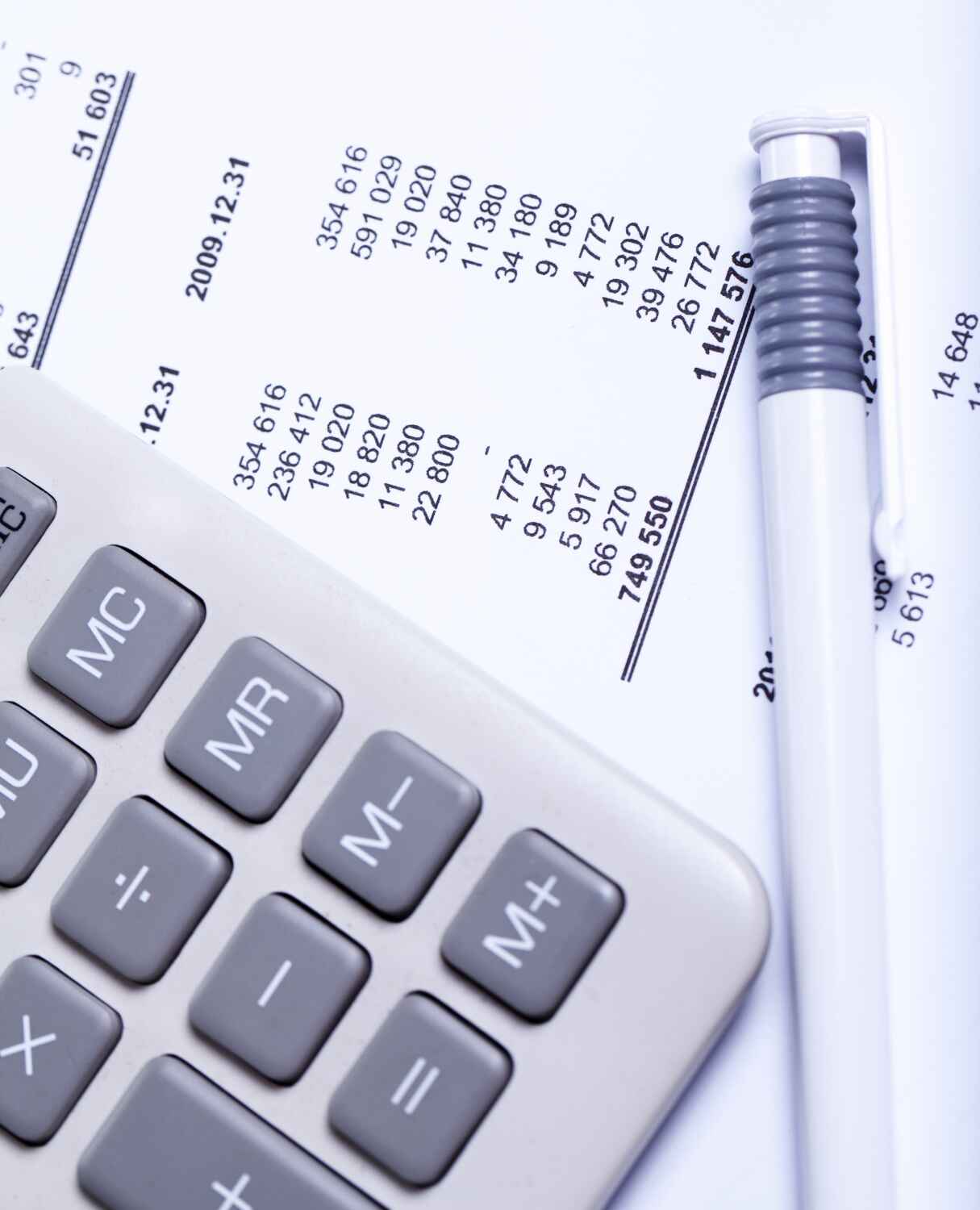 Calculator pen and accounts presented by SK Financial Services https://skfinancial.co